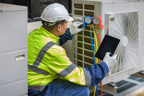 Professional Air Duct Cleaning technician working in Washington Navy Yard, DC